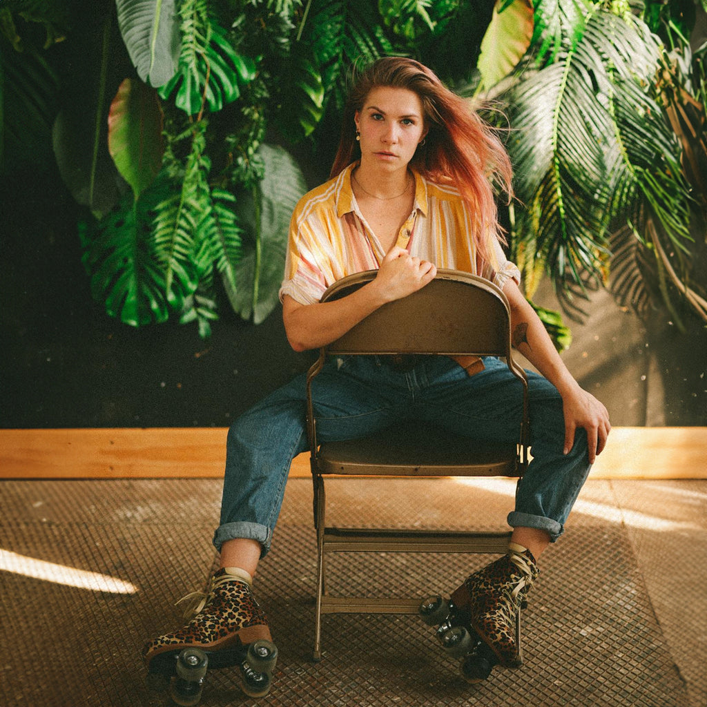 Roces-Piper-Roller-Skate-Leopard-Model-On-Chair