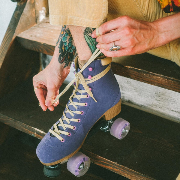 Roces-Piper-Roller-Skate-Purple-Being-Tied-Up-On-Foot